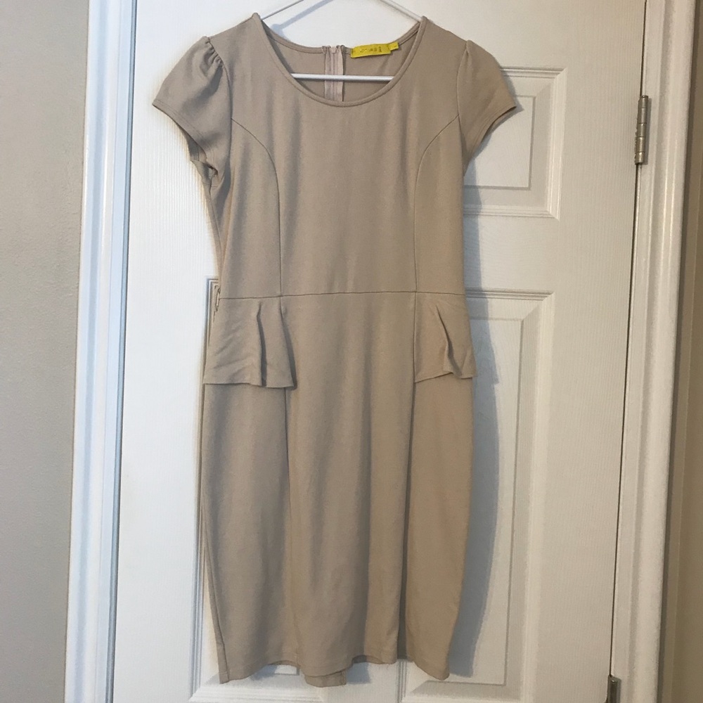 Nude peplum dress size large